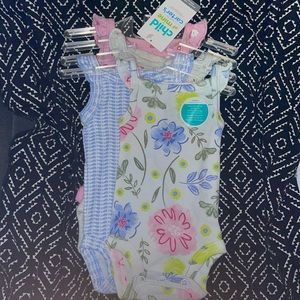 4-piece set of bodysuits